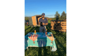 Dar Farzhad, the founder of Southern Tier Balloon Rides, providing a Champagne Toast after a ride